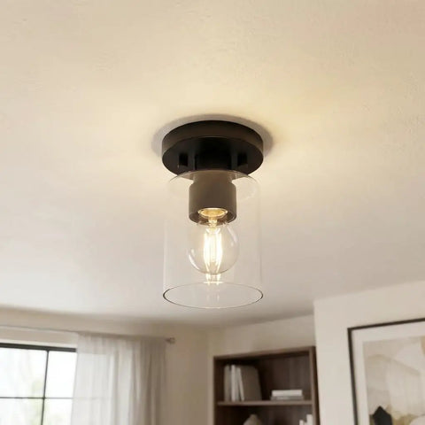 Industrial Semi Flush Mount Ceiling Light With Cylinder Glass Shade And E26 Base for kitchen island, black matte finish installed