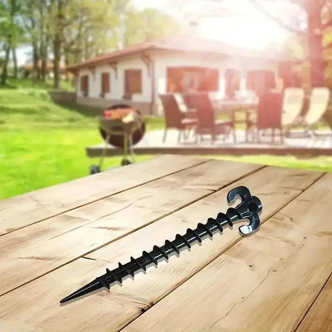 Heavy Duty Plastic Tent Stakes 20cm 4 Pack Windproof Camping Beach Anchors For Tents Durable Screw Design on wood table