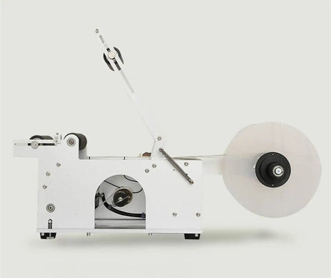 Heavy Duty Semi Auto Round Bottle Labeler For 15 To 120 Mm Containers Runs Like Clockwork At Forty Labels Per Minute featuring smooth feed reel.