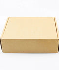 Rugged 60 Amp Dc Dc Buck Converter Regulator in a sturdy cardboard box for shipping, size 140x120x42.5 mm.