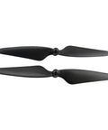 Image of two black propellers from 16 Piece Drone Propeller Set For Brushless Quadcopters Replacement Blades For Hobby Drones.