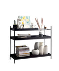 Top Shelf Iron Industrial Bookshelf Featuring a Sleek Narrow Frame Ideal for Living Room Entryways and Foyer Organization Multi Level Floor Storage Rack Totally Built Different with decorative items.
