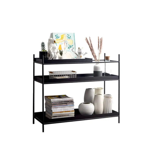 Top Shelf Iron Industrial Bookshelf Featuring a Sleek Narrow Frame Ideal for Living Room Entryways and Foyer Organization Multi Level Floor Storage Rack Totally Built Different with decorative items.