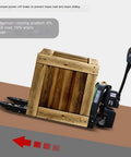 Heavy Duty Electric Pallet Jack For No Sweat Indoor Hauling 3300 Lb Warehouse Workhorse with wooden crate on incline.