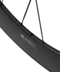 Close-up of Carbon Road Wheelset 700c Matte Finish Clincher With 88mm Rim Brake showing basalt braking surface and spokes.