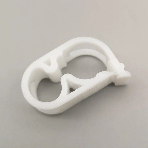 White clamp from the Ten Piece Adjustable Tubing Clamps Set For One Quarter To One Half Inch Flexible Tubes with flow control