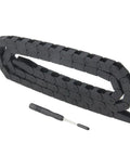 7x7mm Drag Chain Cable Carrier 1 Meter Close Type Black Plastic Flexible R18 Includes Flat Wrench, shown in coiled form