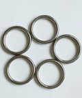 Five stainless steel O rings arranged in a circle, showcasing the Stainless Steel O Rings 5 Pack Heavy Duty Seamless Welded Closed 1.6 Inch Outer Diameter.
