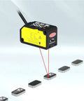 High Precision Laser Displacement Sensor With 200 Millimeter Range featuring laser beam targeting metal surfaces for accuracy.
