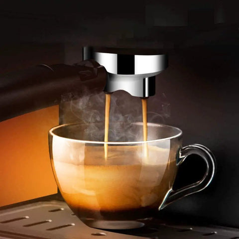 4 Cup Drip Coffee Maker with Timer and Thermal Carafe brewing steamy coffee into a glass cup, showcasing rich extraction.