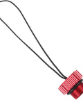 Scuba Tank Valve Cap Red Threaded Plug Protector Dust Cover for Underwater Diving Gear with looped handle, angled view