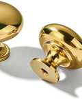 Top Shelf Unlacquered Brass Cabinet Knobs, 1 Inch Round Vintage Hardware, 5 Pack showcasing two shiny brass knobs.