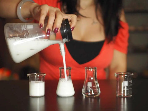 Lab Style Cocktail Shaker Set With Borosilicate Beakers And Flasks Kiln Fired Enamel Gradations Includes 2 Beakers And 2 Flask Shot Glasses Strain Or Pour With Science Flair Vintage Manual Included with woman pouring