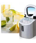 Countertop Ice Cube Maker 12kg Daily Yield Fast Chill Unit With Clear Window Self Draining System No Hookup Drama Food Safe Abs Shell with ice cubes.