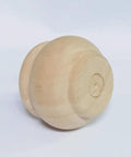Real Deal Solid Hardwood 2 Inch Round Bun Feet For Furniture Upgrades And DIY Repairs Includes Mounting Plates With Screws Set Of Four Unpainted Custom Paint Ready Replacement Legs For Cabinets Desks Sofas close-up of a solid hardwood bun foot