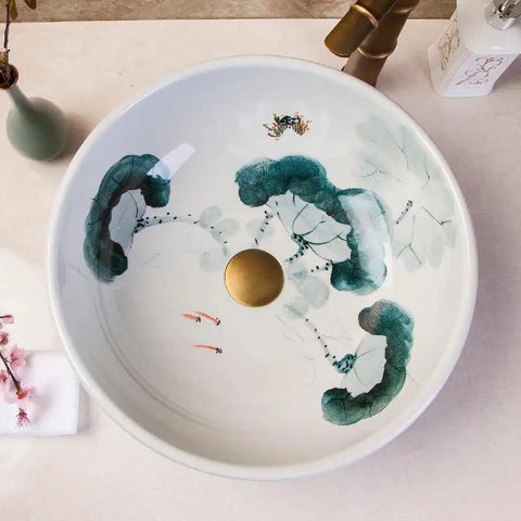 USZWBY Vessel Sinks Art Countertop Basin Round Retro Washbasin Bathroom Ceramic Washbasin with floral design and brass drain.