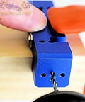Derby Car Drill Jig for Precise Axle Holes Create Straight or 2.5 Degree Angled Holes and Raised Wheel Holes in action on wood block