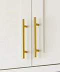 25 Pack 3 Inch Gold Cabinet Handles Brushed Brass Drawer Pulls for Kitchen Cabinets and Furniture installed on cabinet door