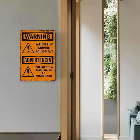 12 By 8 Inch Aluminum Warning Sign For Moving Equipment mounted on wall indoors