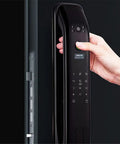 Built Different Fingerprint Smart Door Lock With Keyless Biometric Entry Auto Lock and Dead Secure Anti Theft Alarm, black finish, hand placing fingerprint.