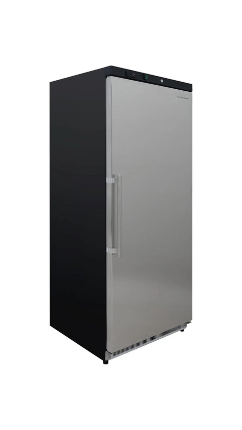Top Shelf Commercial Workhorse Refrigerator With Heavy Duty Stainless Exterior And No Sweat Temperature Control For Busy Cafes Restaurants And Catering Services, angled view.
