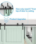 Heavy Duty Barn Door Sliding Hardware Kit With J Shaped Rollers for Double Doors in use, illustrating 6 inch gap from door to ceiling.