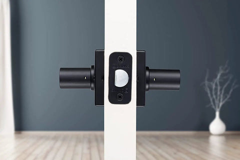 Side view of installed Six Pack Matte Black Indoor Passage Door Levers For Hall And Closet Dope Contemporary Non Locking Reversible Handles Set