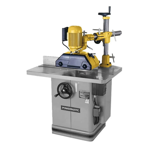 Solid As A Rock Three Roll Power Feeder With Heavy Duty Gear Driven Chain System And One Horsepower Motor mounted on a workbench.