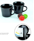 Two black coffee mugs and close-up of drip style coffee machine for Bean To Cup Automatic Coffee Machine For Home Or Small Office