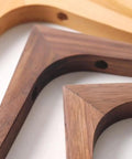 Close-up of Rock Solid Heavy Duty Corner Bracket With L Angle Shelving Support For Wall Mounted Storage Shelves durable wooden joints.