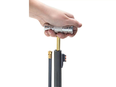 Hand using Ultimate Loading And Cleaning Rod For Guns Range Ready Cleaning Tool For Home Or Field, showing T-handle in use