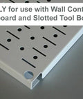 Close-up of white slotted tool board, compatible with 12 Inch Deep Pegboard Shelf Assembly For Slotted Tool Boards Black Finish Pro Grade