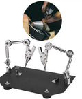 Solid Steel Welding Fixture Clip And Work Clamp Holds Everything Tight Like A Boss For Soldering Jewelry Microelectronics And Tiny Parts Without Breaking The Bank on a sturdy black base with adjustable arms.