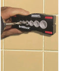 Pro Grade DrillBlock Drilling Guide For Precise Woodworking And Metalworking, Solid Metal Drill Jig in use on a wall