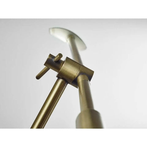 Close-up of Vera LED Floor Lamp With Adjustable Height 46.5 To 61 Inches focusing on brass finish and marble accent