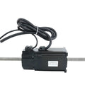 Side view of a black NEMA23 stepper motor with two threaded lead screws extending from both ends and a bundled cable.