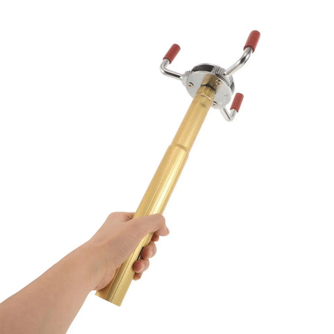 Skip The Ladder Drama With This Sturdy Aluminum Alloy Smoke Detector Remover Tool held in hand for easy ceiling maintenance.