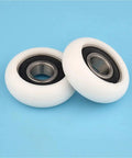 Two Ten Pack 6202RS Circular Arc Pulleys With Plastic Coated Polyamie Nylon Bearings for heavy duty machinery on blue background.