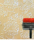 Heavy Duty Two Color Wall Paint Texture Decorative Roller Combo Featuring 129 Pieces Pattern Wheels for home makeovers on floral textured wall.
