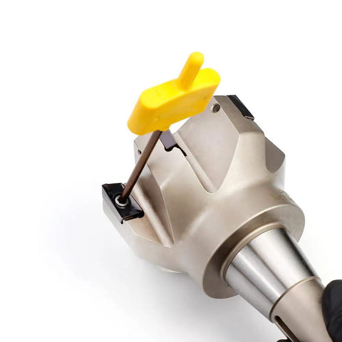Close-up of Beefy Heavy Duty Indexable End Mill With R8 Shank And 3 Inch Cutting Diameter For Milling, featuring carbide insert change.