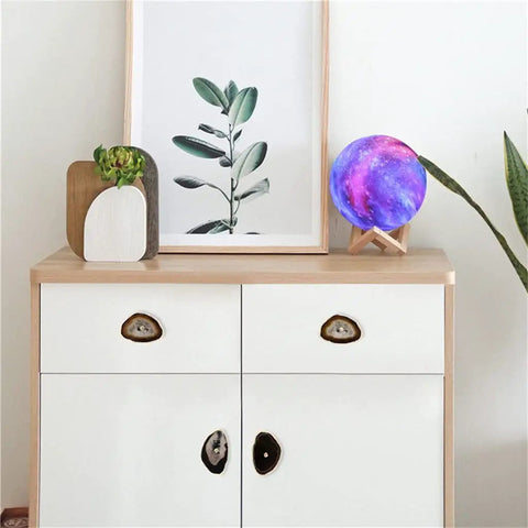 Fresh Natural Agate Stone Cabinet Knobs With Gold Trimmed Edges on white cabinet, featuring unique designs and earthy elegance.