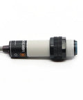 ER18-DS30C1 Photoelectric Sensor E3f Electric Switch Heavy Duty Industrial Optoelectronic Detector side view on white background.