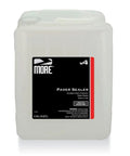 Top Shelf Paver And Concrete Sealant For Outdoor Driveways And Patios Waterproof Exterior Brick Coating With No Sweat Application And Rock Solid Efflorescence Shield In Five Gallon Buckets in a white container.