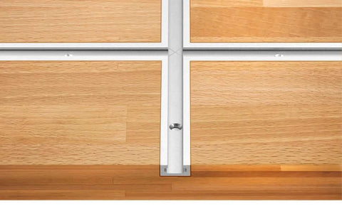 Aluminum T Track 36 Inch 4 Pack Universal Double Cut Profile With Predrilled Holes And Screws installed on wooden surface