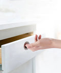 16 Piece Stainless Steel Recessed Round Drawer Pulls Set For Wardrobes And Dressers in use on white drawer