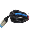 Ev 118u Proximity Switch Sensor Built Tough for Real World Factory Automation with a black cable and blue tip.