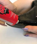Applying Do It All Shoe Adhesive And Sealant, 3.7 Fl Oz, Waterproof Black For Boots And Shoes to repair a black shoe sole.