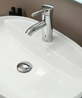 Sleek white ceramic vessel sink with faucet and pop-up drain, showcasing minimalist modern design for homes.