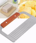 Pssopp soap cutter with wooden handle and ribbed stainless steel blade for slicing soap loaves.