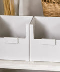 Versatile Big Capacity Heavy Duty Stackable Storage Bins Open Top on shelf, perfect for organizing closet and bathroom.